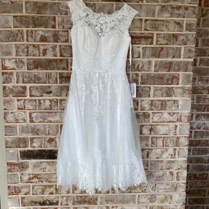 JJ’s House Ivory Lace Fit And Flair Sleeveless Knee Length Wedding Dress
